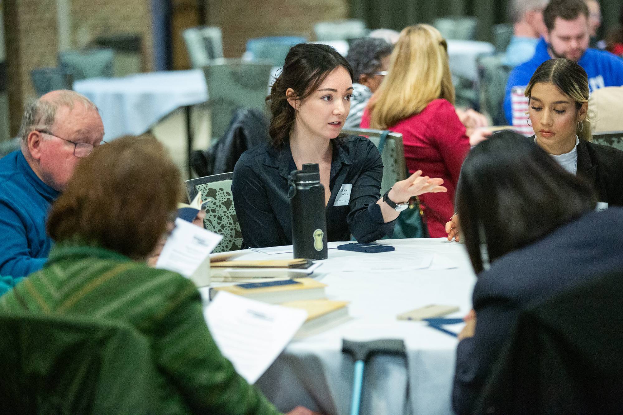 A Cook Leadership Academy Fellow gestures during a workshop.